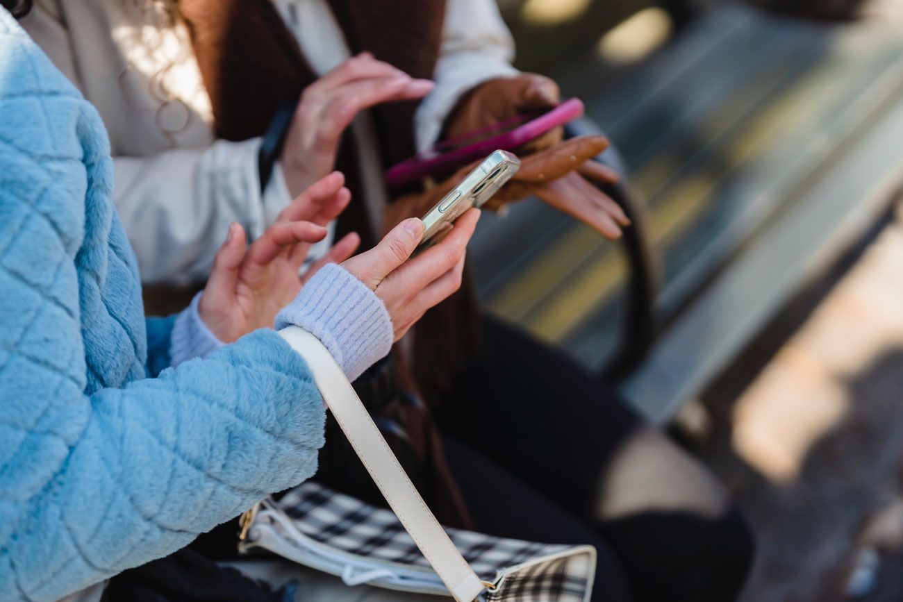 Students using smartphones for outreach and communication