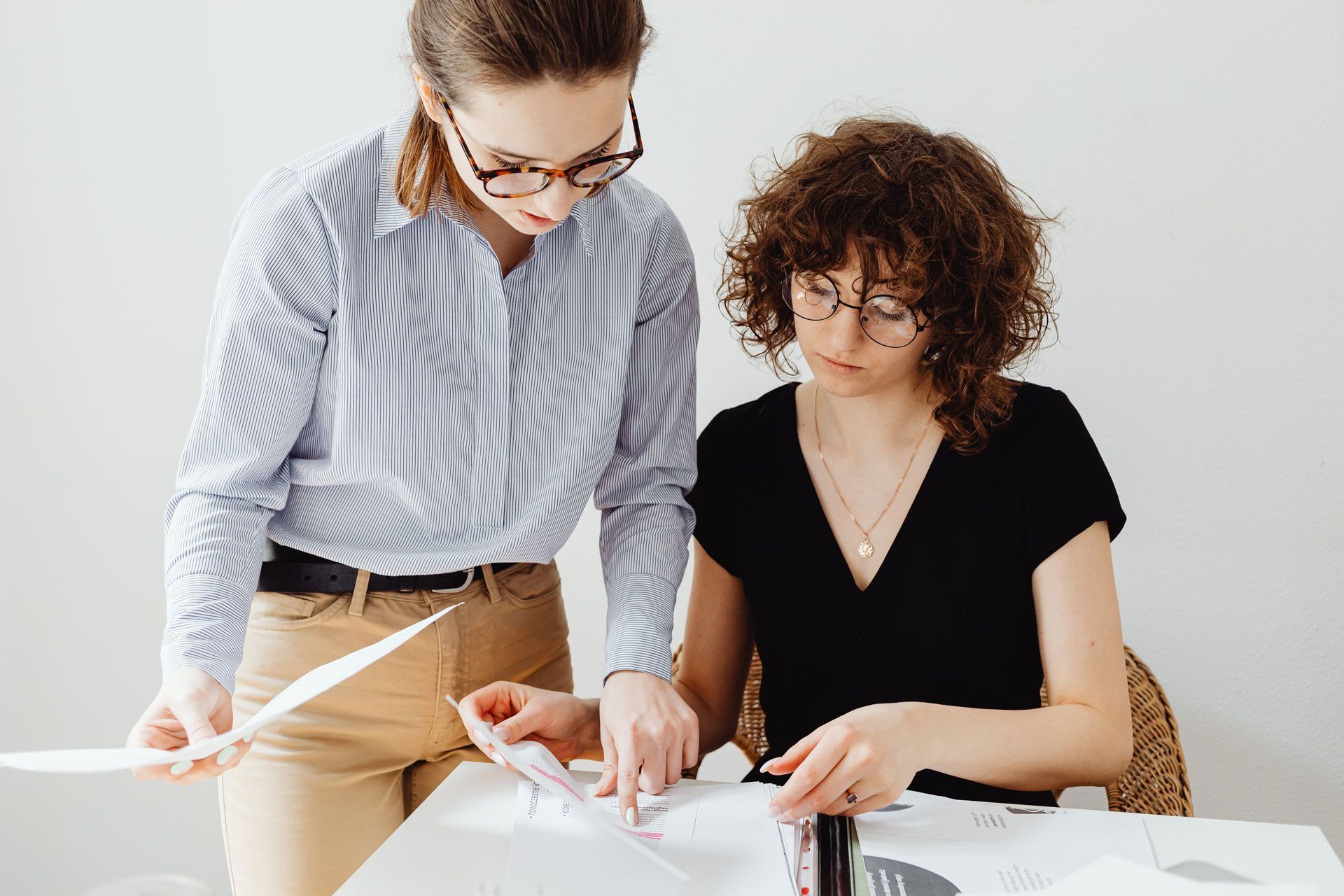 Financial aid professionals reviewing documents together